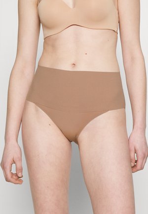 UNDIETECTABLE - Pants - cafe au lait