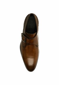Brown leather shoe with a textured side and buckle closure. Features a pointed toe and polished finish. Sole has minimal tread detail.