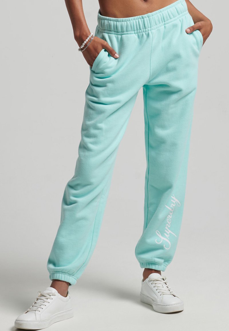 Superdry Tracksuit bottoms cali blue/blue Zalando.co.uk