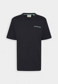 Camiseta de algodón negra con cuello redondo, que presenta un pequeño logotipo en azul claro "SCOTCH & SODA" en la parte izquierda del pecho. Mangas cortas, diseño sencillo.
