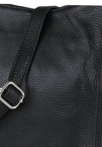 Black leather handbag with a textured surface, featuring a silver-tone buckle on the strap and a clean, minimalist design.