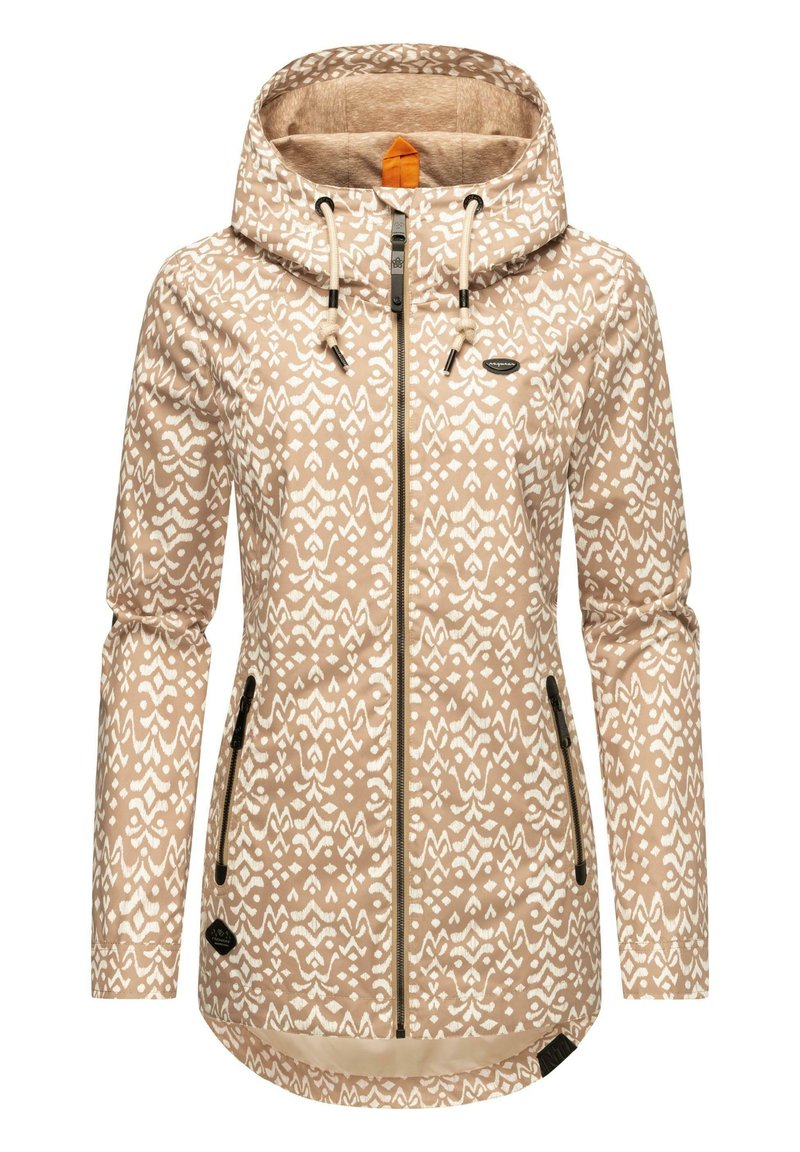 Chaqueta beige con capucha y un patrón geométrico blanco, que cuenta con una cremallera frontal, dos bolsillos laterales y cordones ajustables. Textura suave.