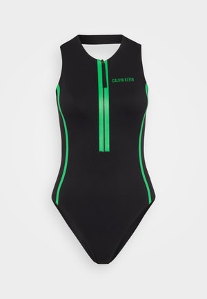 Fekete egyrészes fürdőruha zöld díszítéssel, magas nyakkivágással, középső cipzárral és vízszintes csíkokkal az oldalán.