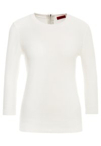 Maglione bianco lavorato a maglia con maniche lunghe, scollo rotondo e zip sul retro. Presenta un tessuto testurizzato e polsini e orlo a costine.