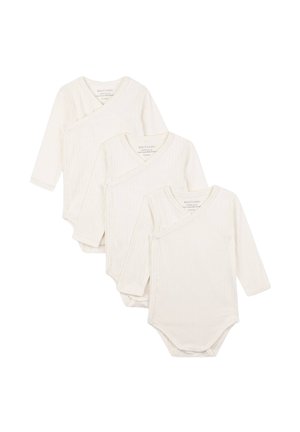 Trois bodies à manches longues pour bébé en crème, fabriqués en tissu côtelé, avec une fermeture au niveau du col et une texture douce pour le confort.
