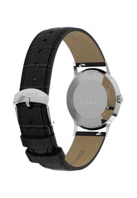 Reloj Timex con correa de cuero negro con relieve de cocodrilo, caja de acero inoxidable y hebilla de plata pulida. Esfera redonda con diseño minimalista.