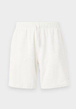 Calções brancos de algodão com cintura elástica e cordão. Design casual com uma textura suave, apresentando bainhas costuradas.