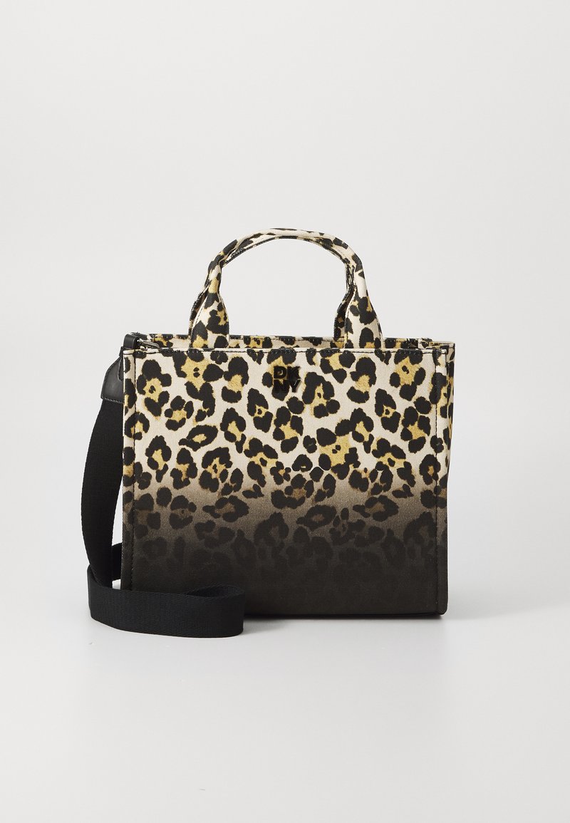 Torba s leopard uzorkom i crnim detaljima, od tekstilnog materijala, s dva gornja držača i odvojivim remenom za rame. Ima zatvaranje na munje.