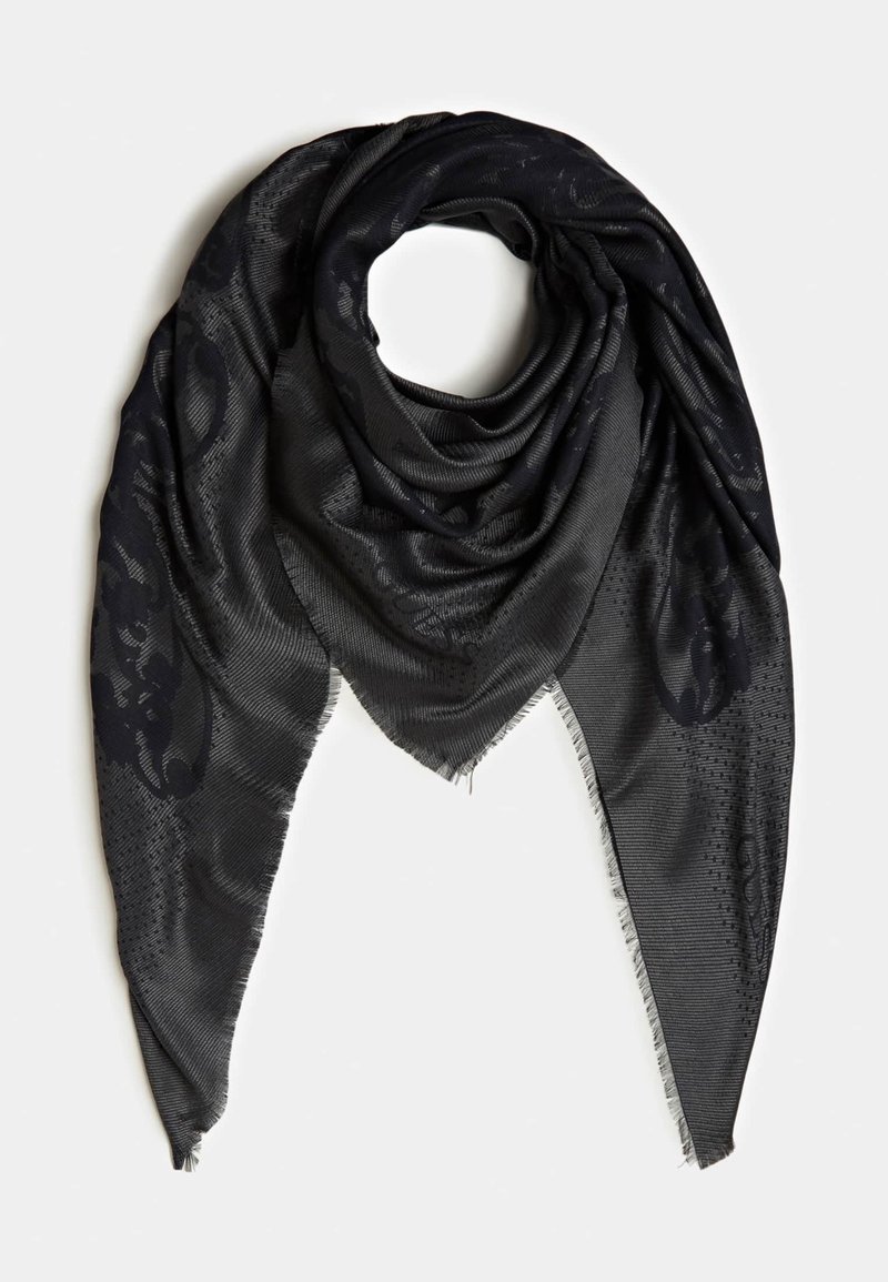 Écharpe triangulaire gris foncé avec des motifs floraux noirs subtils et des bords à franges, soigneusement pliée avec une ouverture circulaire au centre.