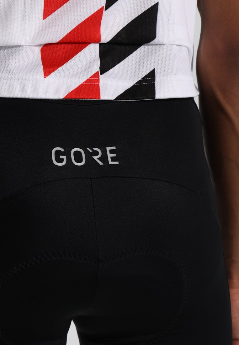 Herren Shirts | Gore Wear C5 OPTILINE KURZE TRÄGERHOSE Tights black/red/rot - QG28112 Herren Shirts | Gore Wear C5 OPTILINE KURZE TRÄGERHOSE Tights black/red/rot - QG28112