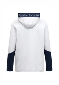 Weißer Hoodie mit marineblauen Akzenten. Verfügt über eine große Kapuze und einen mit Peak Performance gebrandmarkten Halsausschnitt. Weiche Textur mit langen Ärmeln und Seitenteildesign.