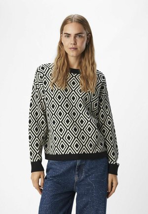 Sort og crème sweater med diamantmønster, lange ærmer og ribbede manchetter og kant. Stoffet har en struktureret strikket overflade.
