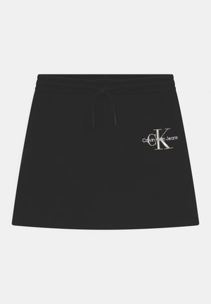 Schwarzer Calvin Klein Minirock mit elastischem Bund, Kordelzug, Seitentaschen und gesticktem CK Jeans-Logo auf der rechten Vorderseite.