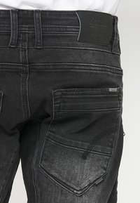STRETCH BERMUDA - Džínové kraťasy - denim black