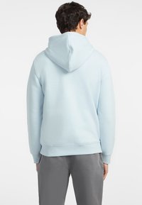 Guess Jeans ICONIC - Felpa con cappuccio - himmelblau