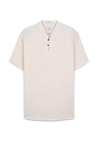Maglietta a maniche corte, colletto rotondo in cotone beige chiaro con finitura strutturata; presenta una patta con tre bottoni scuri.