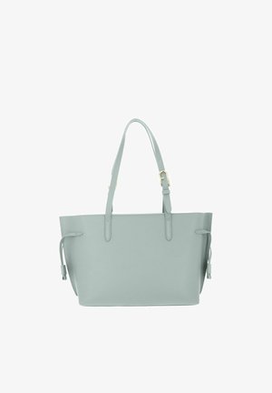 Sac fourre-tout en cuir gris clair avec doubles bretelles, boucle réglable sur une sangle et détails de nouages latéraux aux deux extrémités.