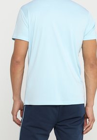 Ellesse Triko s potiskem - light blue