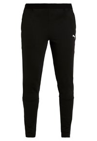 Zwarte sportieve broek met een slim fit, voorzien van een trekkoord in de taille, zijzakken en een wit logo op de linkerdij. Gemaakt van een gladde stof.