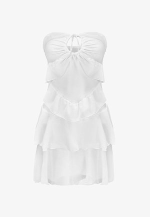 Biała sukienka bez rękawów z warstwowymi falbanami, marszczonym dekoltem i wiązaniem w kształcie łezki przy szyi.