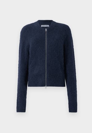 Navy blue fuzzy zip-up cardigan with long sleeves and ribbed cuffs, displayed on a white background.