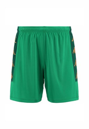 Pantaloni sportivi verdi con cintura elasticizzata e pannelli laterali in mesh con marchio arancione. Tessuto leggero con una superficie liscia.