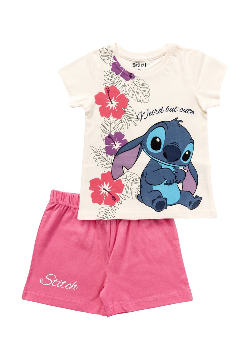 Lasten kahden osan setti, jossa on kreeminvärinen paita, jossa on Stitch-hahmo, kukkakuosisia yksityiskohtia, teksti "Weird but cute" ja vaaleanpunaiset joustavuusvyötäröshortsit, joissa on teksti "Stitch".
