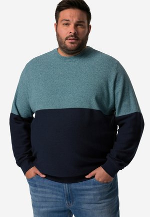 Maglione crew-neck blu scuro e verde petrolio con un design testurizzato, con una parte inferiore blu scuro solida e polsini e orlo a coste.