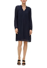 Marineblaue plissierte Kleid mit langen Ärmeln, V-Ausschnitt und Kordelzug-Details. Hergestellt aus leichtem Material, endet oberhalb des Knies.