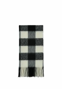 Wollen sjaal in een zwart-wit ruitpatroon met franjes aan de randen. Heeft afwisselend grote vierkanten in effen zwart en wit.