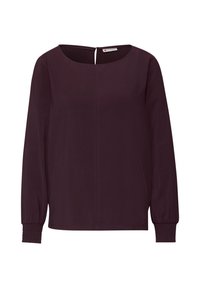 Dlouhý rukáv, tmavě burgundský top s kulatým výstřihem, zadním otvorem ve tvaru klíče a nařasenými manžetami. Hladká tkanina s jemným leskem.
