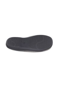 Suela de zapato de goma negra con patrones de agarre texturizados, que presenta un borde exterior liso y un diseño curvado para flexibilidad y comodidad.