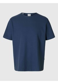 Marinblå bomullströja med rund hals, korta ärmar och avslappnad passform. Har en liten etikett på sömmen i sidan.