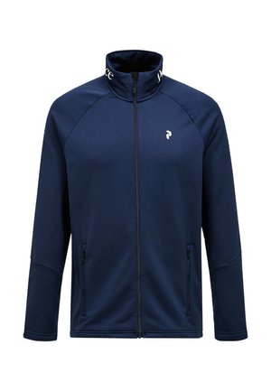 Marineblauwe vest met rits en hoge kraag, gemaakt van gladde stof. Voorzien van zijzakken en een klein logo op de borst en kraag.