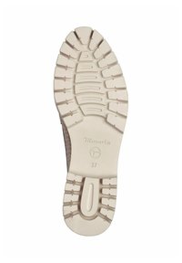 Zool van een schoen met een gestructureerd, lichtbeige rubber en diepe groeven voor grip. Merkennaam "Tomoris" en maat "37" geperst.