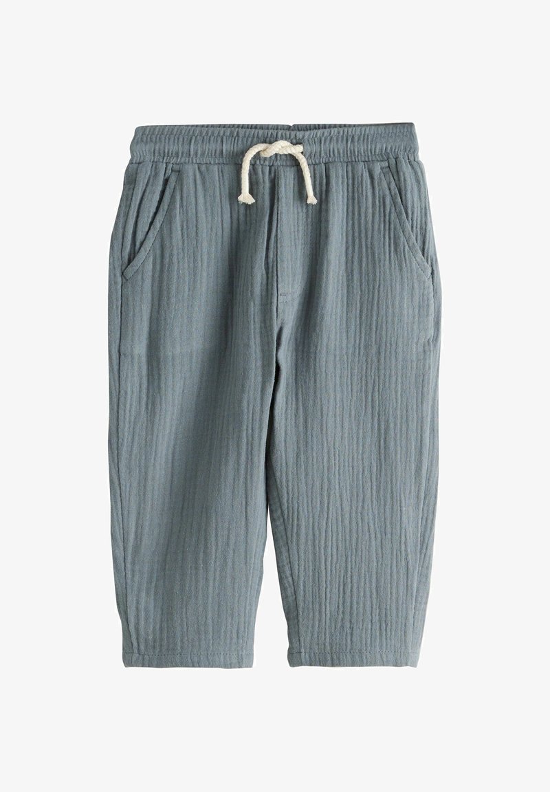 Hellgraue Baumwoll-Joggerhose mit strukturierter Oberfläche, elastischem Bund und Kordelzug. Mit zwei Seitentaschen und zulaufenden Beinen.