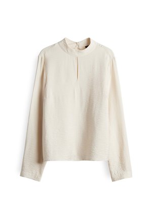 Cremefarbene Bluse mit langen Ärmeln, hohem Kragen und kleinem Schlüsselloch-Ausschnitt vorne, aus leichtem, strukturiertem Stoff gefertigt.