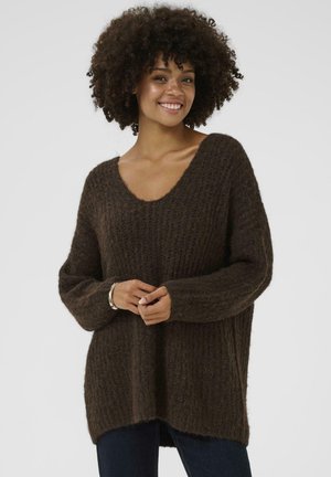 Brown fluffy knit sweater with a wide V-neck, ribbed texture, and long sleeves. Loose fit and slightly longer at the back.