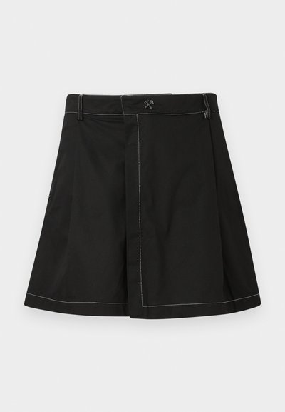 Black A-line skirt with white contrast stitching, belt loops, and a small crossed hammer logo on the waistband front center.