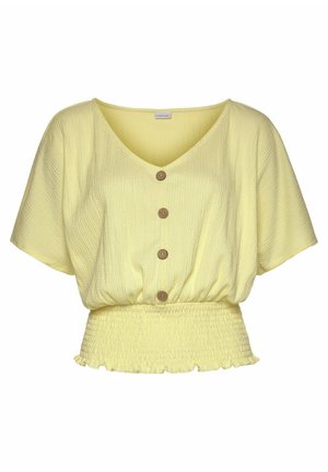 Yellow short-sleeve blouse with a V-neck, three brown buttons down the front, and a smocked waist with a ruffled hem. Textured fabric.