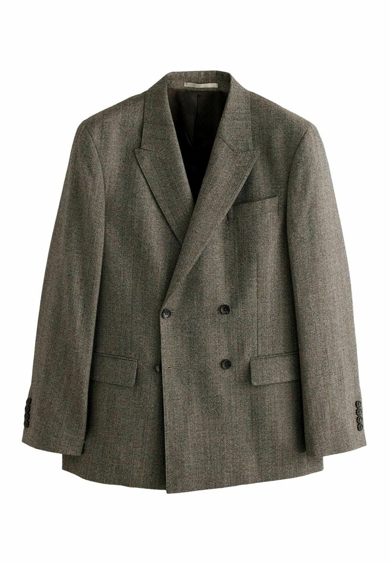 Doppelt gefütterter Blazer aus braunem Tweed. Auffällige Merkmale sind die Reverskragen, zwei Fronttaschen und Knopfmanschetten. Gefüttertes Innenfutter.