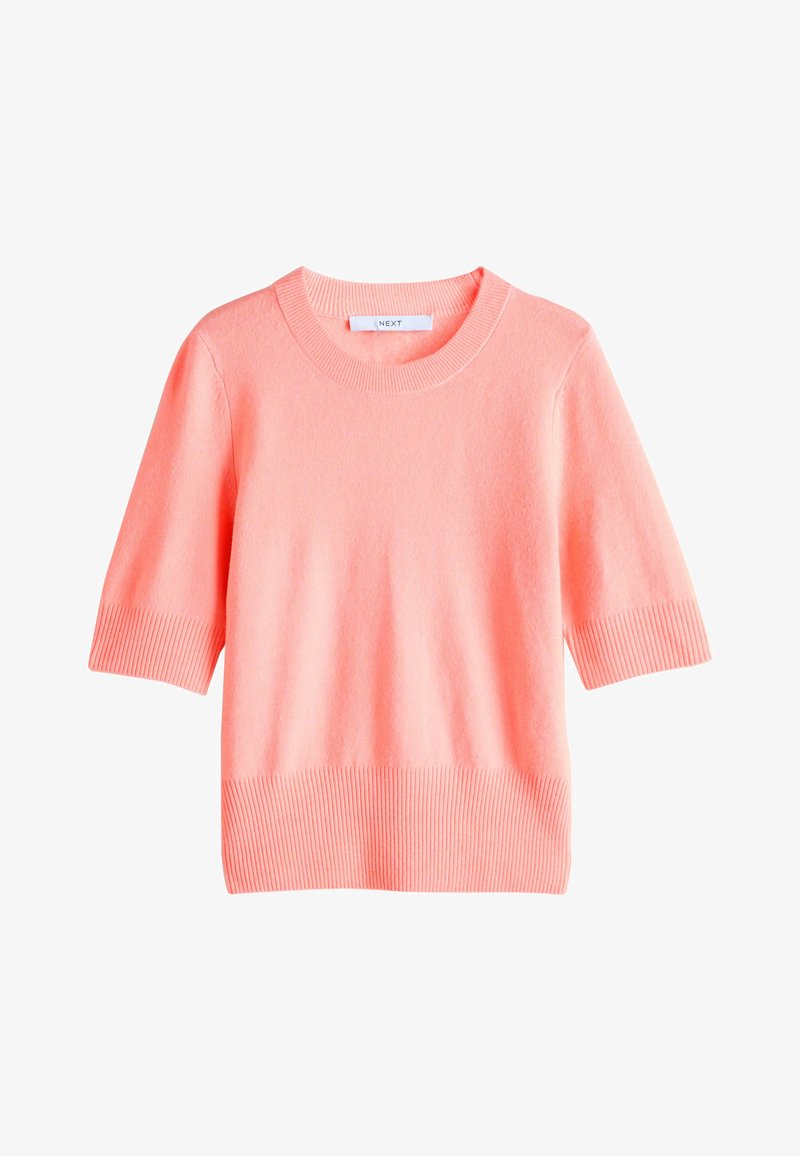 Pull en maille rose corail à manches courtes avec poignets, ourlet et encolure ronde côtelés.