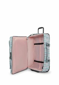 Soft pink lined trolley suitcase with pastel leaf pattern, open showing interior straps, outer handle, and retractable black handle extended.