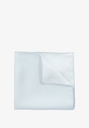 Jasnoniebieski złożony serwetka z delikatnie podniesionym rogiem, ukazująca gładką strukturę materiału.