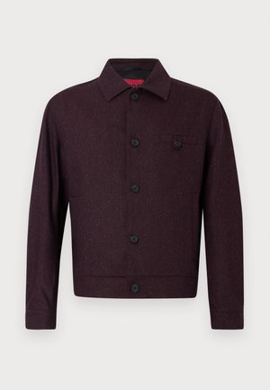Dark maroon button-up jacket with long sleeves, a collar, and a single buttoned chest pocket on the left side.