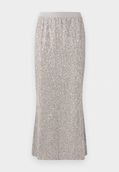Knee-length, hõbedast sädelev seelik, millel on sobiv vöökoht, vertikaalsete säravmustrite ja külgsalvritega liikumise mugavuse tagamiseks.