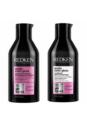 Zwei schwarze Redken-Flaschen mit der Aufschrift "Acidic Color Gloss Shampoo pH 5,0-5,6" und "Conditioner pH 3,5-4,5", jeweils 500 ml, mit pinken Etiketten.