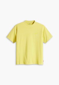 Yellow cotton t-shirt with a crew neckline, short sleeves, and a small logo printed on the upper left. Soft texture and casual cut.