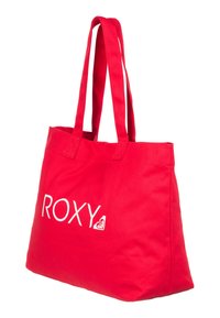 Rode canvas schoudertas met dubbele schouderbanden, met de merknaam "ROXY" in het wit gedrukt. Eenvoudig ontwerp, ruime binnenkant.