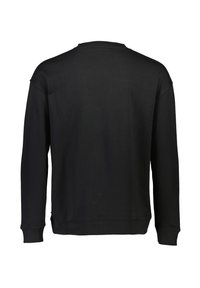 Sudadera negra con cuello redondo, mangas largas y puños acanalados. Confeccionada con una tela suave y lisa con un diseño sencillo y sólido.